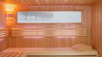 Sauna Baleo met binnenbekleding van hemlock, raam en gekleurd licht