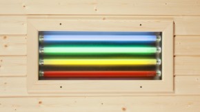 Sauna kleurenlicht van Röger in een sauna met bekleding van fijnspar